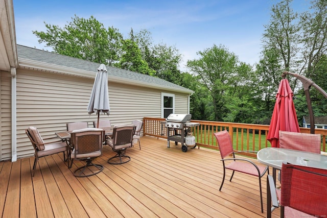 82 Shipman Dr, Glastonbury, CT 06033 - wooden deck featuring outdoor dining space and a grill