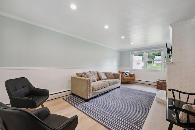 82 Shipman Dr, Glastonbury, CT 06033 - living room with a baseboard radiator, wainscoting, wood finished floors, recessed lighting, and ornamental molding