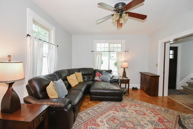 17 Adams St, Winchester, CT 06098 - living room with a ceiling fan and stairs