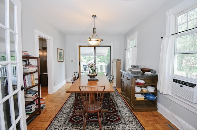 17 Adams St, Winchester, CT 06098 - dining room with healthy amount of natural light and cooling unit