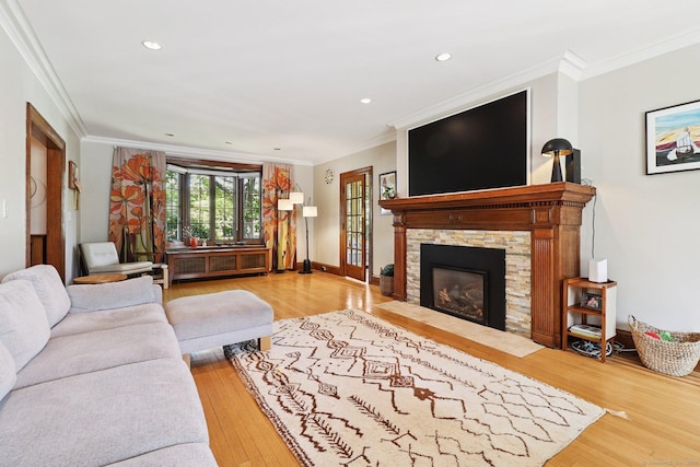 110 Westwood Rd, New Haven, CT 06515 - living room with wood finished floors, ornamental molding, a stone fireplace, and recessed lighting