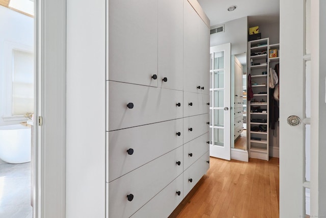 110 Westwood Rd, New Haven, CT 06515 - walk in closet with light wood-style flooring