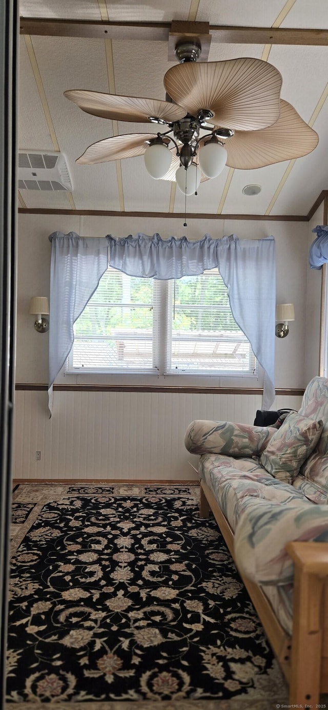 306 Old Colchester Rd Unit 197, Salem, CT 06420 - living room with plenty of natural light, ceiling fan, and wooden walls