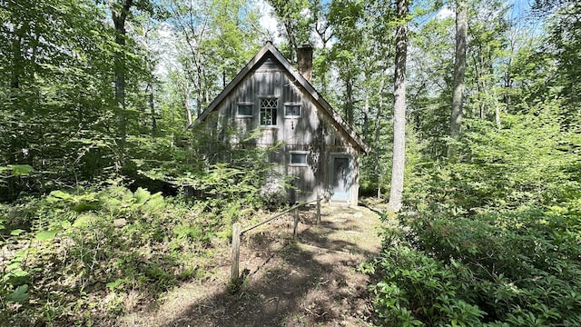 6 Rocky Cove Ln, Cornwall, CT 06796 - view of front facade featuring a chimney and an outbuilding