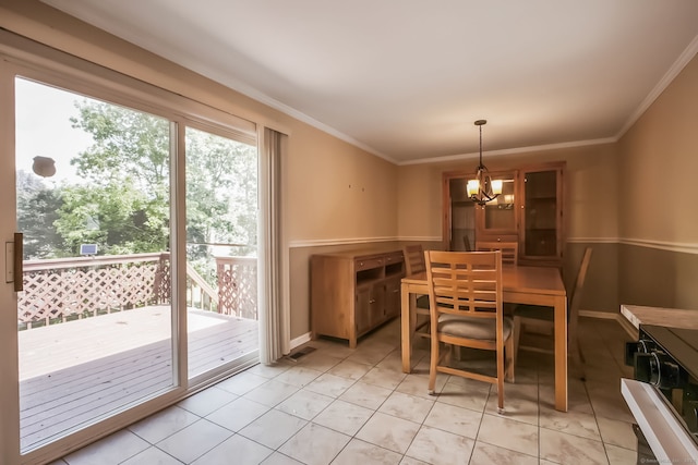 39 Wells Ave, Shelton, CT 06484 - dining space with a chandelier, ornamental molding, and light tile patterned floors
