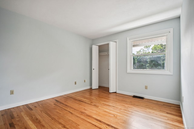 39 Wells Ave, Shelton, CT 06484 - unfurnished bedroom with light wood finished floors and baseboards