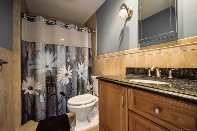 39 Wells Ave, Shelton, CT 06484 - full bathroom featuring tile walls, vanity, a shower with shower curtain, and wainscoting
