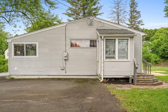 47 Charter Rd, Ellington, CT 06029 - view of side of property with a shingled roof