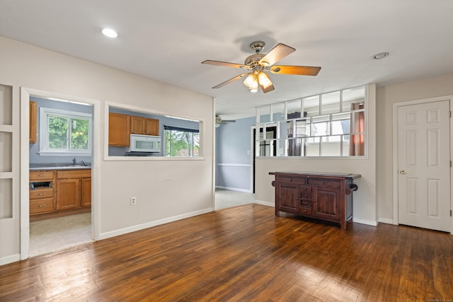 47 Charter Rd, Ellington, CT 06029 - unfurnished living room featuring ceiling fan, wood finished floors, healthy amount of natural light, and recessed lighting