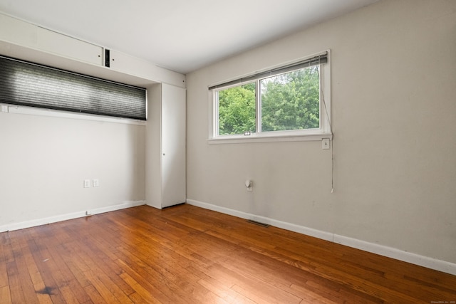 47 Charter Rd, Ellington, CT 06029 - empty room with hardwood / wood-style floors and baseboards