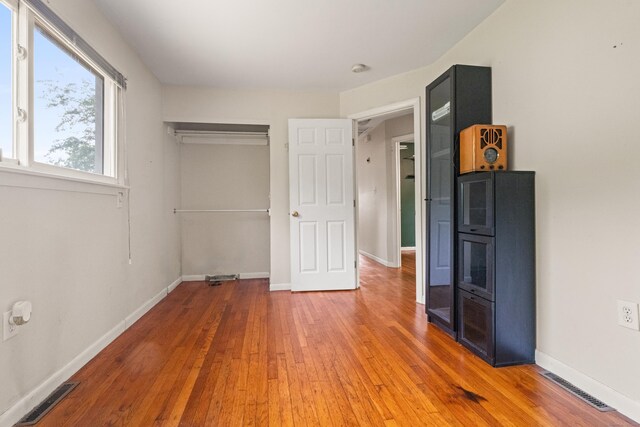47 Charter Rd, Ellington, CT 06029 - unfurnished bedroom featuring light wood finished floors and baseboards