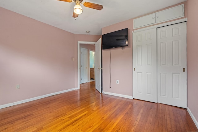 47 Charter Rd, Ellington, CT 06029 - unfurnished bedroom featuring light wood-type flooring, a closet, and ceiling fan