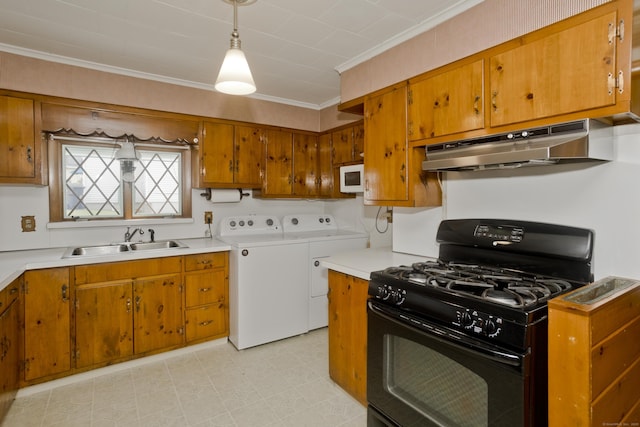 282 Halladay Dr, Suffield, CT 06093 - kitchen with black gas stove, washing machine and clothes dryer, under cabinet range hood, brown cabinetry, and crown molding