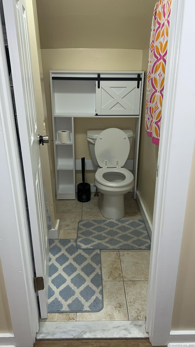 115 Lloyd St, New Haven, CT 06513 - bathroom featuring toilet and tile patterned floors
