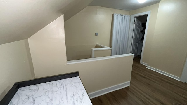 115 Lloyd St, New Haven, CT 06513 - hallway featuring dark wood finished floors, an upstairs landing, and lofted ceiling