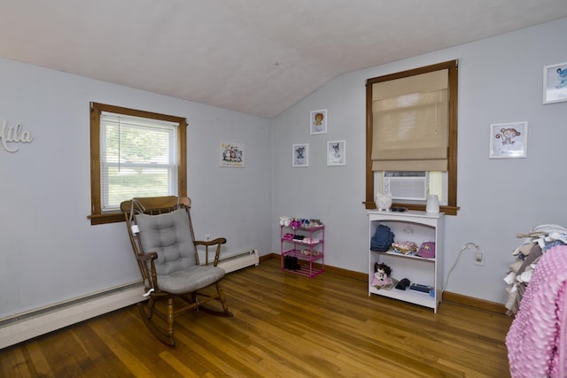 26 Sandpiper Rd, Enfield, CT 06082 - living area featuring wood finished floors, a baseboard heating unit, lofted ceiling, a baseboard radiator, and cooling unit