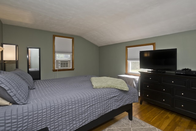 26 Sandpiper Rd, Enfield, CT 06082 - bedroom with wood finished floors, vaulted ceiling, and cooling unit