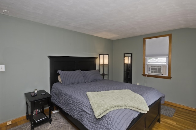 26 Sandpiper Rd, Enfield, CT 06082 - bedroom with wood finished floors and a textured ceiling