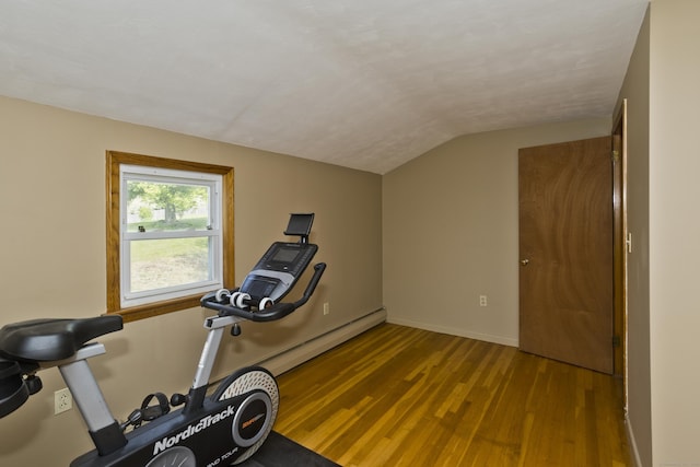 26 Sandpiper Rd, Enfield, CT 06082 - workout room featuring vaulted ceiling, wood finished floors, and baseboard heating