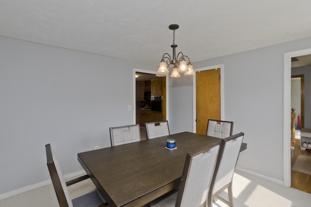 26 Sandpiper Rd, Enfield, CT 06082 - dining room with a chandelier and light carpet