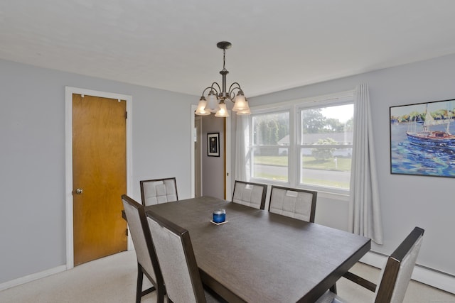 26 Sandpiper Rd, Enfield, CT 06082 - dining space with a chandelier and a baseboard radiator