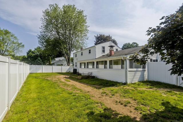 26 Sandpiper Rd, Enfield, CT 06082 - fenced backyard featuring a sunroom