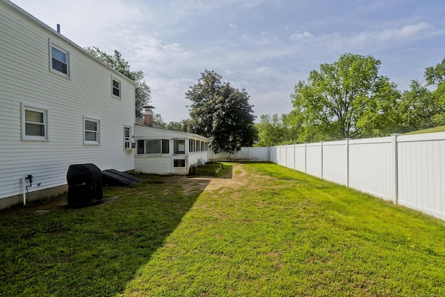 26 Sandpiper Rd, Enfield, CT 06082 - fenced backyard featuring a sunroom