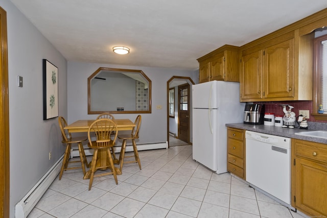 26 Sandpiper Rd, Enfield, CT 06082 - kitchen featuring white appliances, a baseboard heating unit, dark countertops, backsplash, and brown cabinets