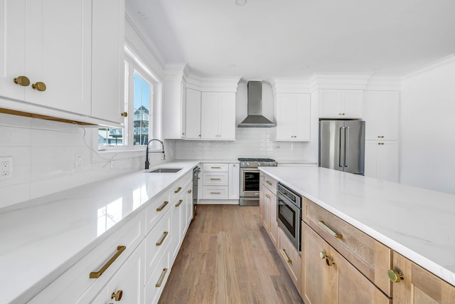 LotA Roseville Street, Fairfield, CT 06825 - kitchen with wall chimney range hood, premium appliances, wood finished floors, tasteful backsplash, and white cabinets