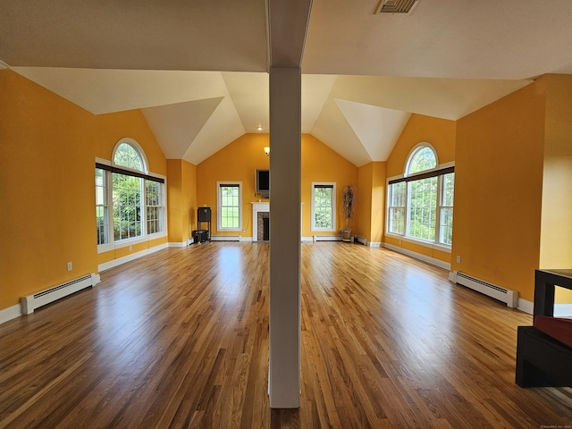 41 Mesa Dr, Bethany, CT 06524 - unfurnished living room featuring a baseboard radiator, wood finished floors, a fireplace, and high vaulted ceiling