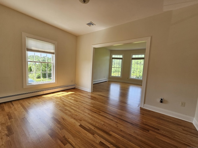 41 Mesa Dr, Bethany, CT 06524 - empty room featuring a baseboard radiator and wood finished floors