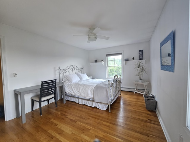 41 Mesa Dr, Bethany, CT 06524 - bedroom with wood finished floors, a baseboard radiator, and ceiling fan