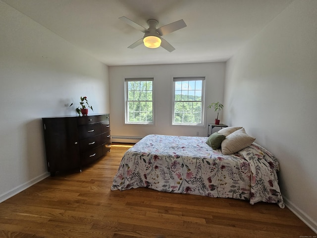 41 Mesa Dr, Bethany, CT 06524 - bedroom featuring baseboard heating, wood finished floors, and a ceiling fan