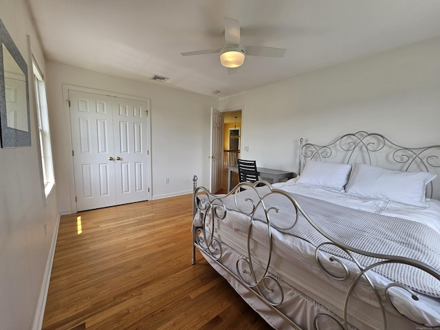 41 Mesa Dr, Bethany, CT 06524 - bedroom with light wood finished floors, a closet, and a ceiling fan