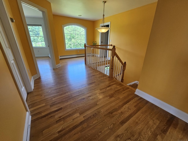 41 Mesa Dr, Bethany, CT 06524 - corridor featuring an upstairs landing, wood finished floors, and a baseboard heating unit