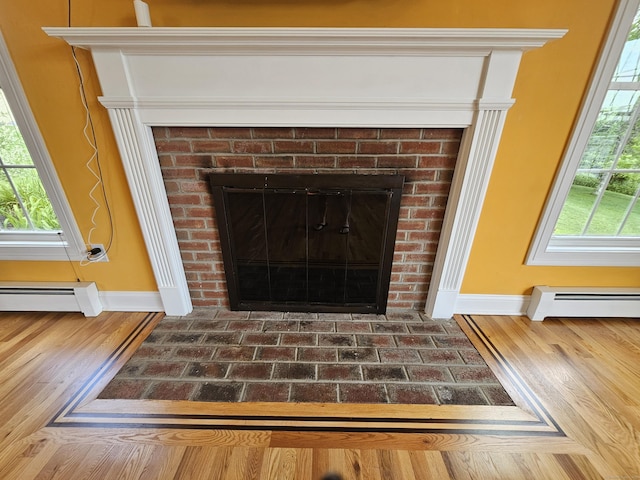 41 Mesa Dr, Bethany, CT 06524 - detailed view of a baseboard heating unit and a fireplace