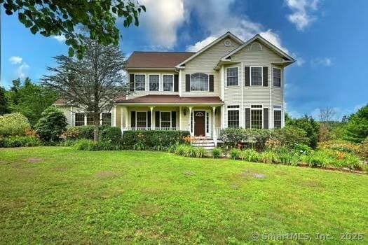 41 Mesa Dr, Bethany, CT 06524 - view of front facade featuring covered porch and a front lawn