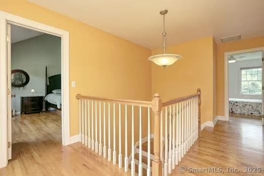 41 Mesa Dr, Bethany, CT 06524 - corridor with wood finished floors