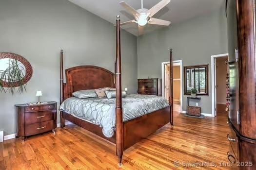 41 Mesa Dr, Bethany, CT 06524 - bedroom with wood finished floors, high vaulted ceiling, and a ceiling fan