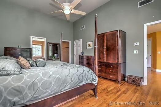41 Mesa Dr, Bethany, CT 06524 - bedroom with high vaulted ceiling, wood finished floors, and ceiling fan