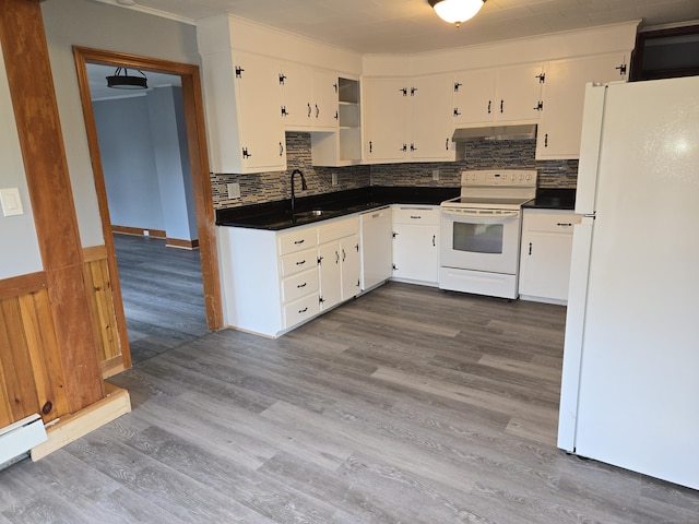 64 Pine St, Torrington, CT 06790 - kitchen featuring white appliances, under cabinet range hood, dark countertops, and white cabinetry