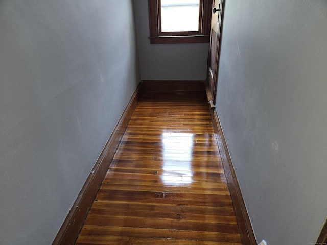 64 Pine St, Torrington, CT 06790 - corridor featuring dark wood-style floors and baseboards