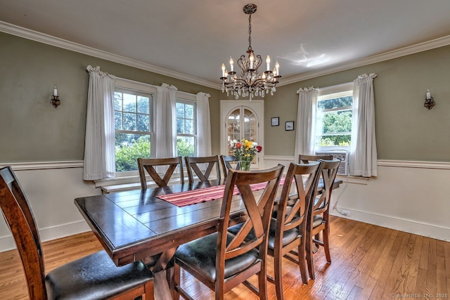 345 Spring St, Cheshire, CT 06410 - dining space featuring a chandelier, ornamental molding, and light wood finished floors
