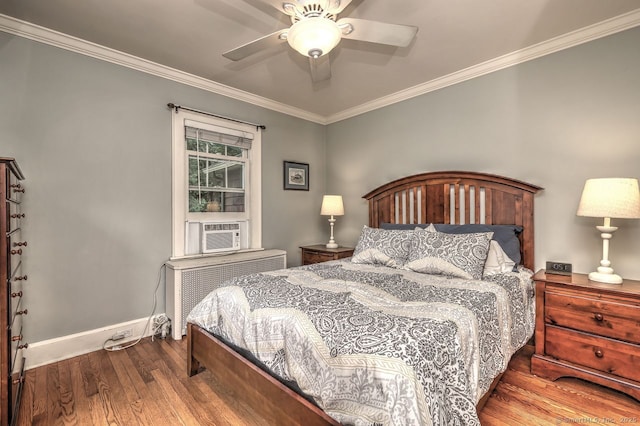 345 Spring St, Cheshire, CT 06410 - bedroom with radiator heating unit, wood finished floors, ornamental molding, cooling unit, and ceiling fan