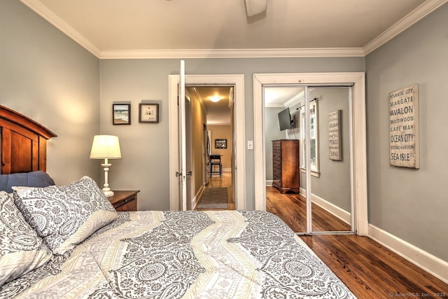 345 Spring St, Cheshire, CT 06410 - bedroom featuring crown molding, dark wood-type flooring, and a closet