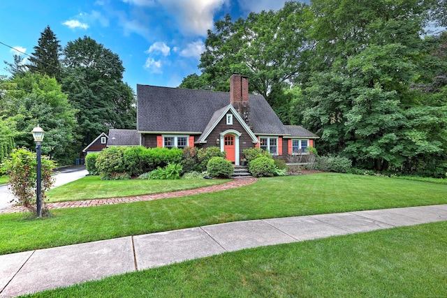 345 Spring St, Cheshire, CT 06410 - view of front facade featuring a front lawn, a chimney, and a shingled roof