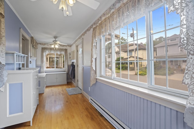 169 Peck Ave, West Haven, CT 06516 - unfurnished sunroom with baseboard heating
