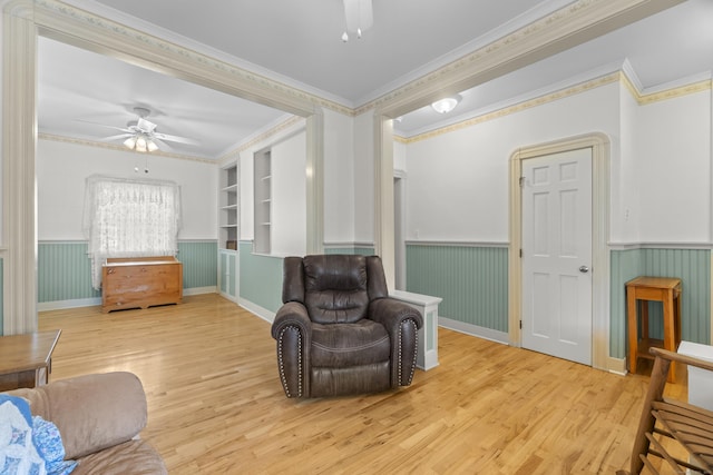 169 Peck Ave, West Haven, CT 06516 - sitting room featuring ceiling fan, wood finished floors, wainscoting, and crown molding
