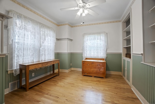 169 Peck Ave, West Haven, CT 06516 - empty room featuring a wainscoted wall, ceiling fan, and wood finished floors