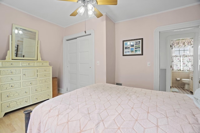 169 Peck Ave, West Haven, CT 06516 - bedroom featuring ornamental molding, wood finished floors, ceiling fan, a closet, and connected bathroom